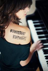 Beautiful shoulders, beautiful notes, tattoos