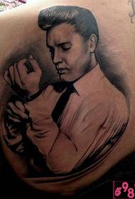 Half shoulder Elvis character portrait tattoo picture