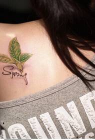 Beautiful girl shoulder beautiful green leaf English tattoo picture