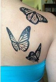 Provide a scapula butterfly tattoo picture