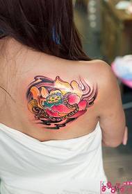 Traditional lotus back shoulder tattoo picture