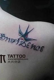 Little swallow letter tattoo