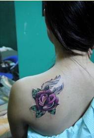 Vacker och vacker ser färgglad ros tatuering bild
