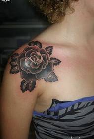 Girl's shoulders beautiful looking a rose tattoo picture
