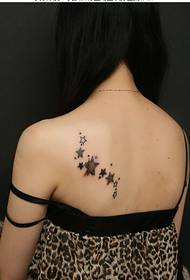 Beautiful girl with a nice looking five-pointed star tattoo pattern picture
