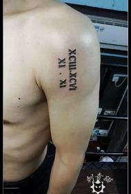 Roman numeral tattoo pattern on the shoulder