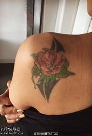 Rose tattoo pattern on the shoulder thorns