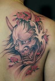 Handsome monster tattoo picture on the shoulder