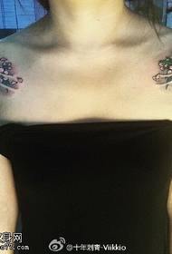 Cherry blossom tattoo on the shoulder