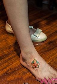 Fresh and beautiful small flowers instep tattoo pictures