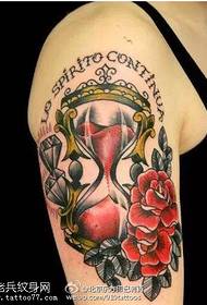 Shoulder rose inlaid classic hourglass prick tattoo pattern