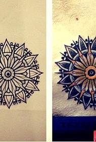 Recommend a geometric flower tattoo pattern