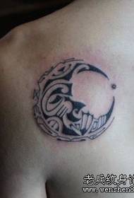 Shoulder totem moon tattoo