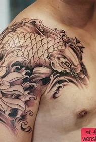 Shoulder black and white lotus carp tattoo work