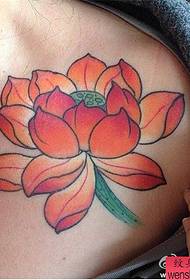 Woman shoulder color lotus tattoo work