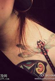 Women's shoulder color dragonfly tattoo works by tattoos