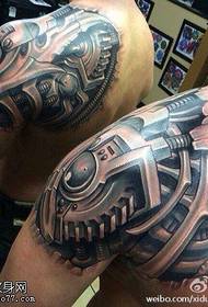Shoulder mechanical tattoos are shared by the tattoo hall