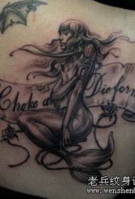 Beautiful woman shoulder black gray mermaid tattoo