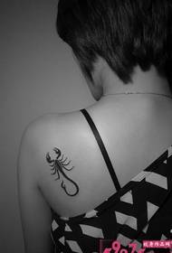 Girl shoulder black and white scorpion totem