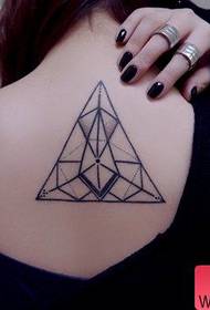 Woman shoulder back geometric tattoo pattern