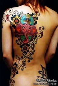 Woman shoulder traditional elephant god tattoo pattern