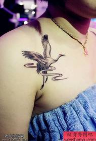 Women's shoulders, cranes, tattoos, and tattoos are shared by tattoos.