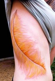 good-looking yellow feather tattoo on the female waist