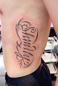 male side waist large flower body English word tattoo