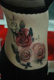 female waist rose tattoo