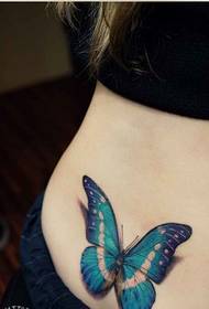 froulike taille moade útsichtende kleur vlinder tatoeage patroanfoto