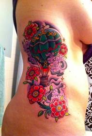 female waist hot air balloon tattoo