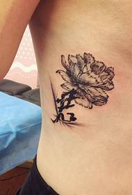 men's waist and flower tattoo