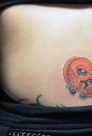 small and cute cartoon squid tattoo