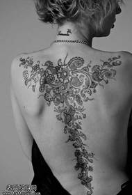 black and white image flower vine tattoo pattern