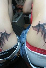 couple back waist demon wings Cross tattoo