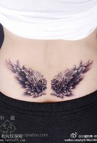 female waist wing tattoo pattern