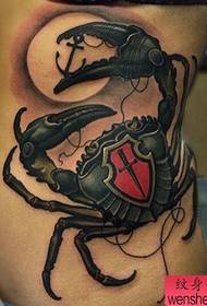 side waist crab tattoo work