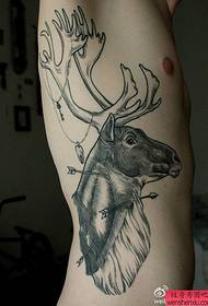 a side waist antelope tattoo pattern