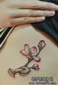 a woman's waist flower tattoo pattern