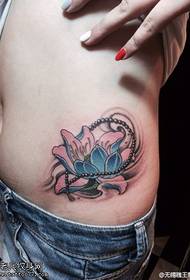 female side waist colored beads lotus tattoo pattern