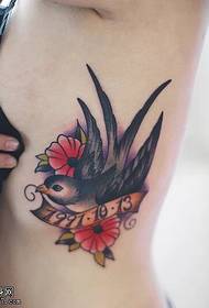 female side waist color swallow flower tattoo pattern