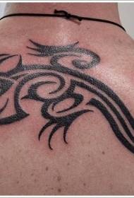 tillbaka svart tribal ödla tatuering mönster