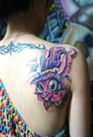 colorful animal back tattoo