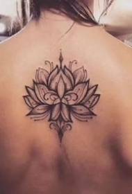 Girls' beautiful black-gray tattoo tattoos on the back spine