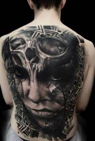 full back black and white mysterious tribal female portrait combined with skull tattoo pattern