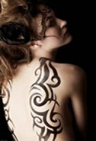 sexy back flower vine tattoo
