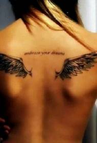 meitenes muguras spārni un uzraksts tetovējums modelis