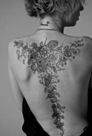 girl's back beautiful black and white flower tattoo pattern