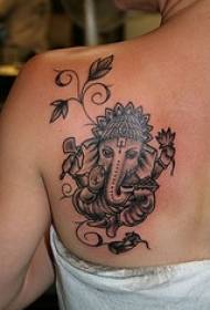 Ganesh like god and vine back tattoo pattern