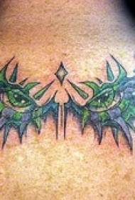 modeli i tatuazheve me sy të gjelbër dhe gjemba